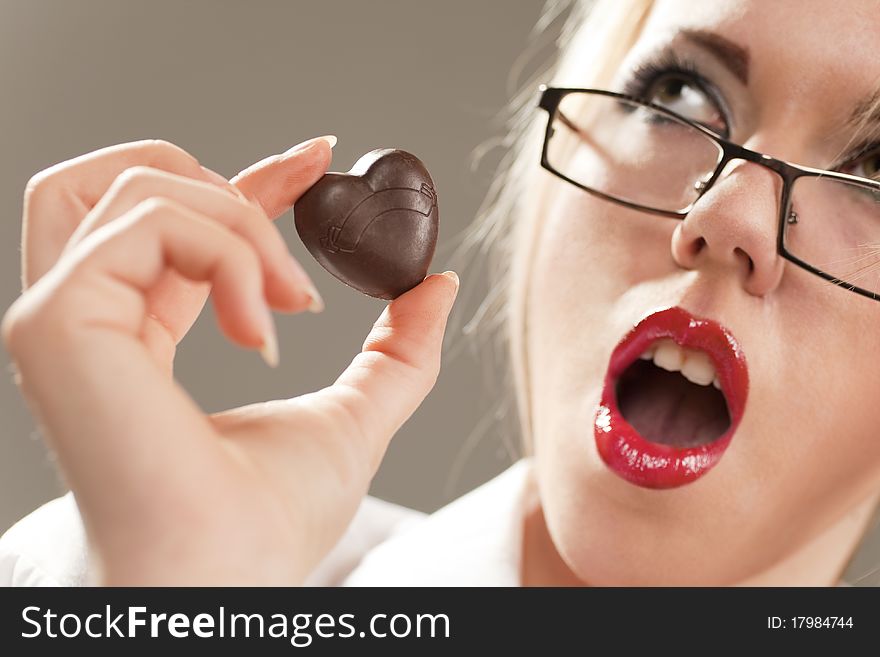 Woman holding chocolate heart