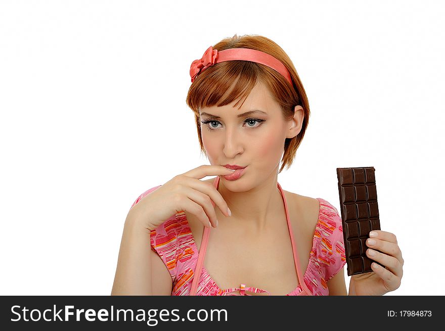 Beautiful woman eating chocolate bar. isolated on white background. Beautiful woman eating chocolate bar. isolated on white background