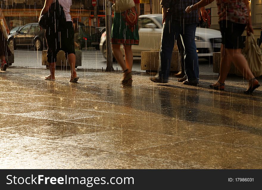 Crowd walking - group of people walking together in the rain(motion blur). Crowd walking - group of people walking together in the rain(motion blur)