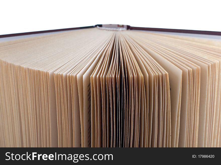 Open old book on white background. Isolated.