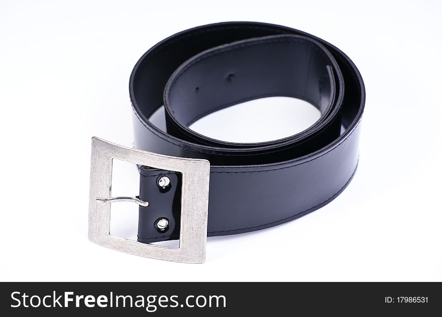 Belt strap and buckle wrapped up on a white background