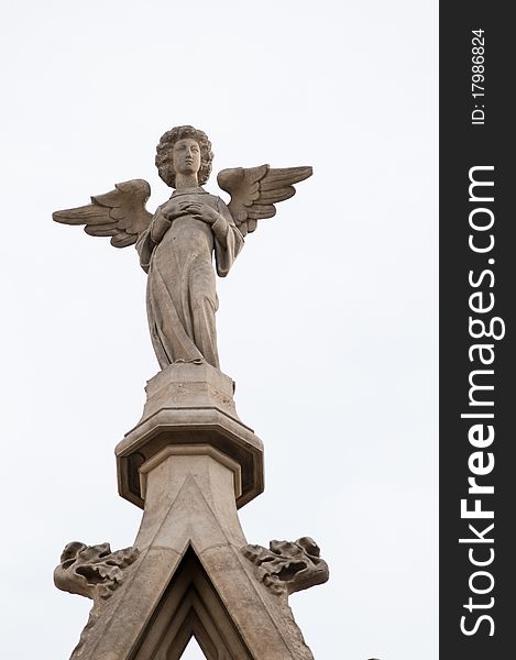 Angel Statue on Gothic Cathedral in Barcelona