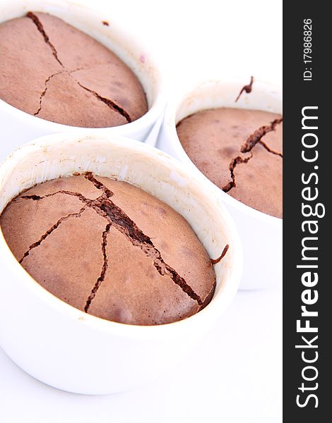 Chocolate souffles on white background