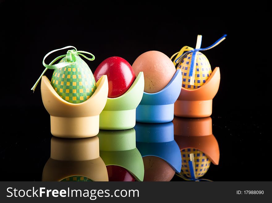 Easter eggs are a dark background reflection vase