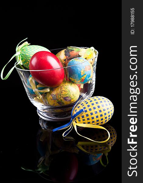 Easter eggs are a dark background reflection vase