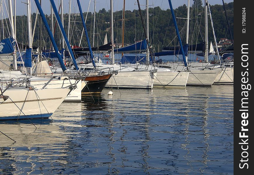 Sailboats at a pier in Salo, Italy. Sailboats at a pier in Salo, Italy