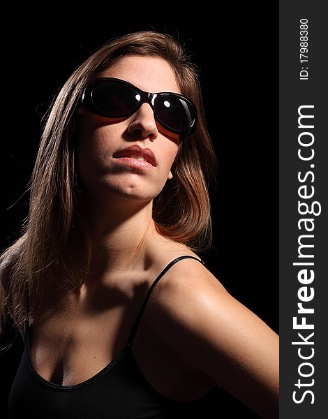 Beautiful Young Woman Wearing Dark Sunglasses