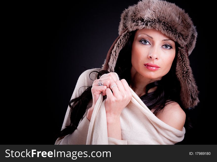 Attractive girl in winter fur hat