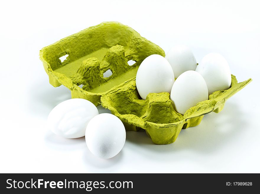 Eggs in the box isolated on white