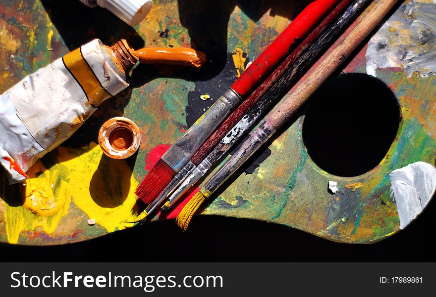 Used painting instruments illuminated by sun. Used painting instruments illuminated by sun