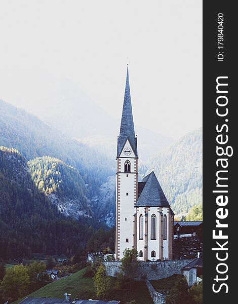 Famous church at the Heiligenblut town at the austrian alpine Grossglockner road  at the autumn day