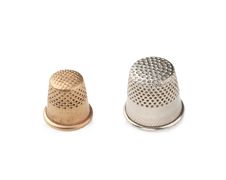 Ooper And Metal Thimbles Stock Images