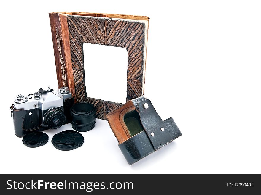Vintage camera and photo album with empty picture. Isolated on white. Vintage camera and photo album with empty picture. Isolated on white