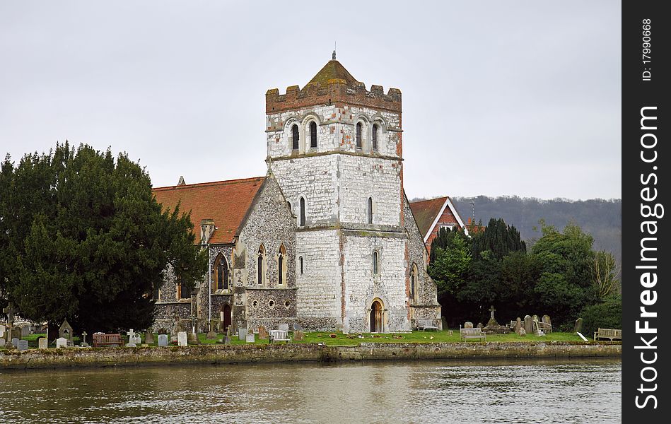 Bisham All Saints Church with Norman Tower on the banks of the River Thames in England. Bisham All Saints Church with Norman Tower on the banks of the River Thames in England
