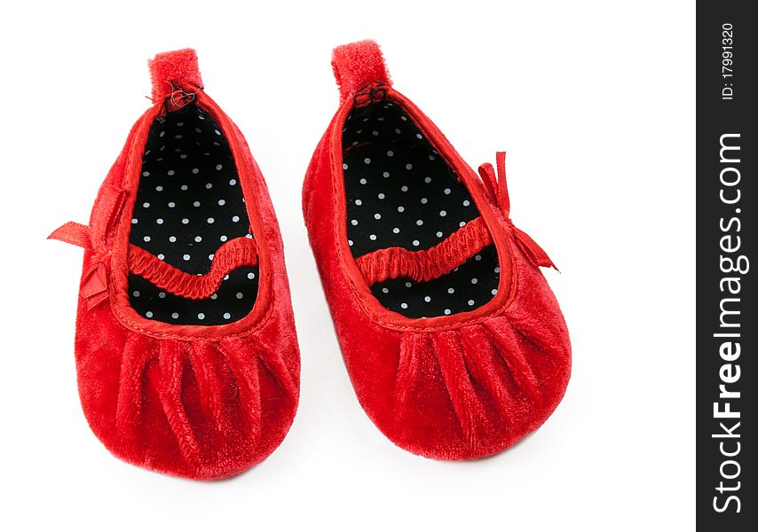 Red baby booties isolated on white background