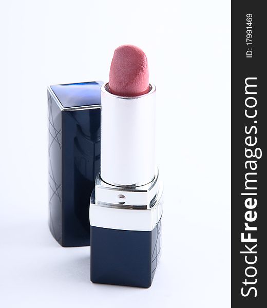 Red lipstick isolated on white