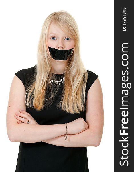Beautiful girl with her mouth sealed with black tape