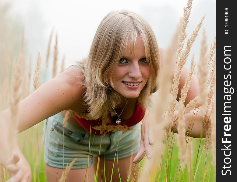 In The Field young lady smile. fog