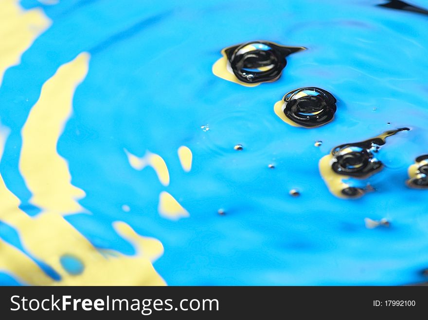 Colored Drops On The Water Surface