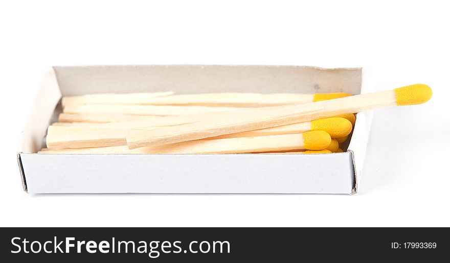 Open boxes of wooden matches and yellow-head