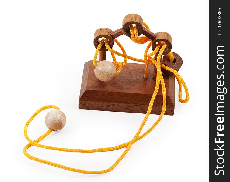 Wooden puzzle with a yellow rope and balls