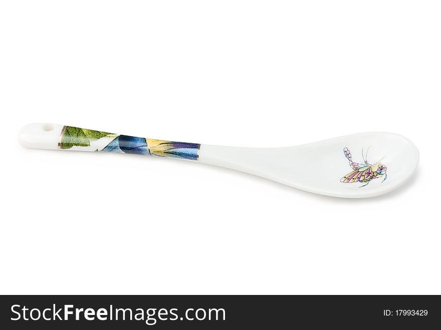 Porcelain teaspoon isolated on a white background