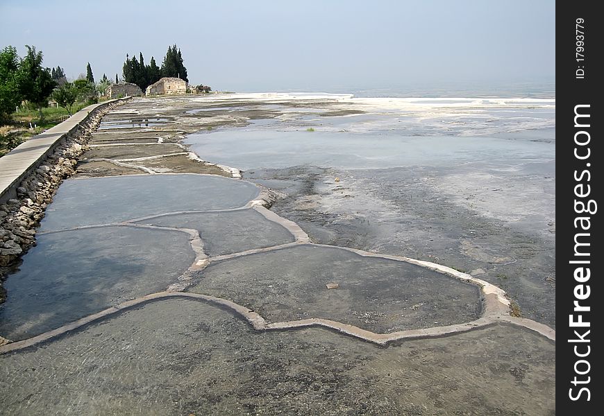 Shallow blue cyan travertine pools at Pamukkale Turkey. Shallow blue cyan travertine pools at Pamukkale Turkey