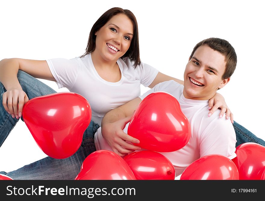 Couple with a red heart on white background