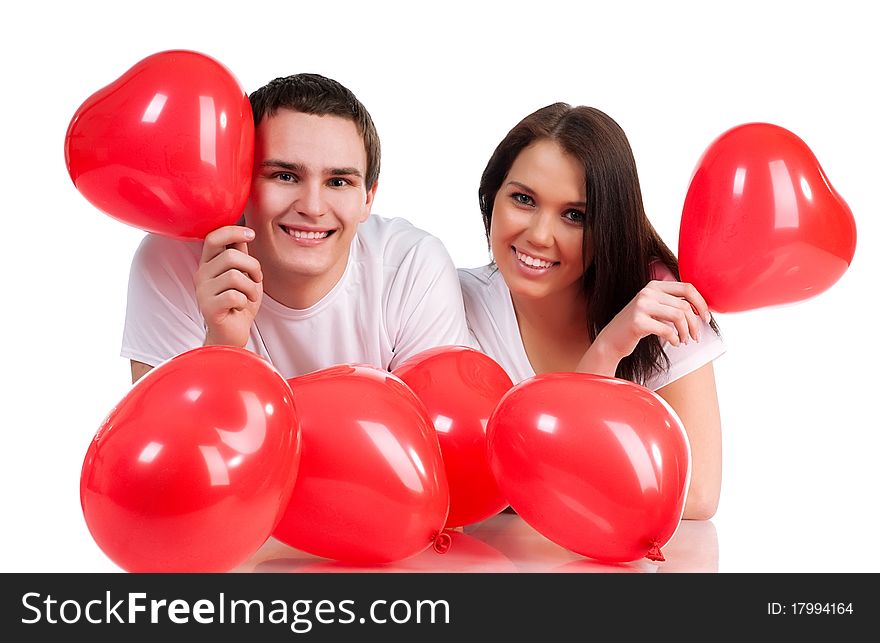 Couple with a red heart on white background
