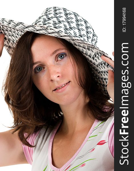 Beautiful woman portrait in a hat isolated on white