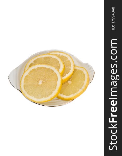 Lemons on a plate, isolated