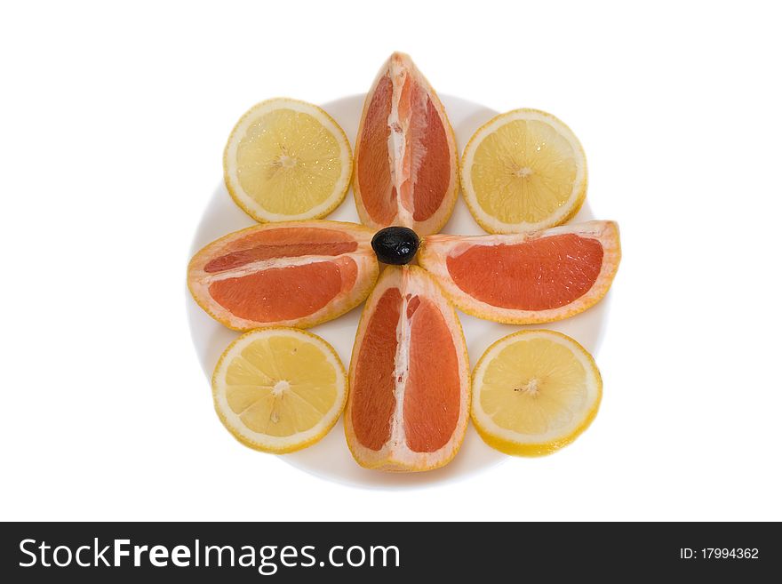 Citron set on a white plate, on a white background, isolated