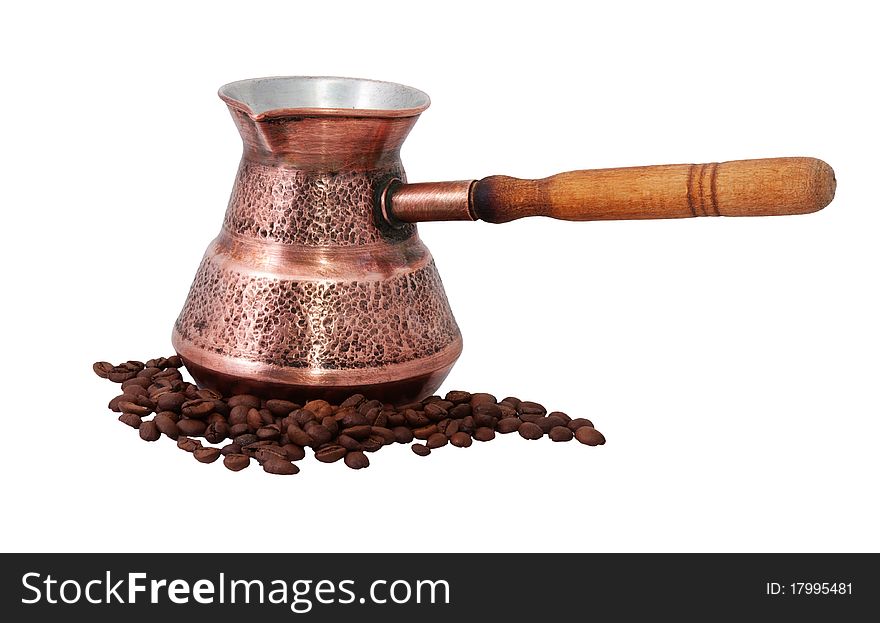 Old coffeepot and coffee beans