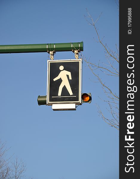 Pedestrian sign with nature view