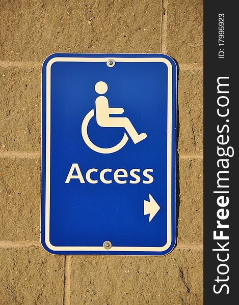 Disable access sign on wall with sunset light