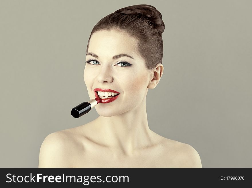 Portrait of beautiful woman with red lipstick