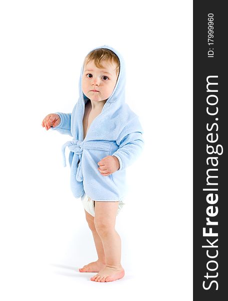 Baby in blue bathrobe on white