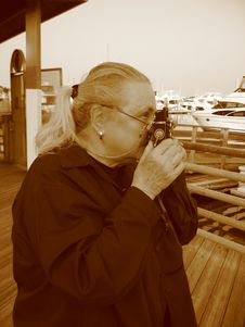 Woman Taking A Photo Stock Photos