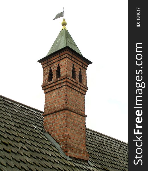 Brick chimney and shingle roof (architectural detail)