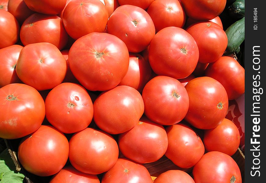 Closeup view of tomatoes at a farmers' market. Closeup view of tomatoes at a farmers' market