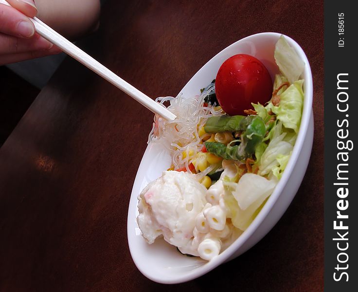 Salad and chopsticks-interesting perspective