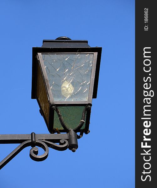 Street light on blue sky background
