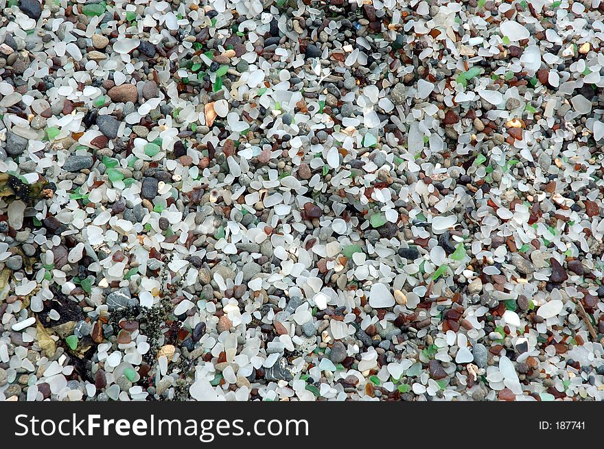 Shore at Glass Beach small pieces of worn glass. Shore at Glass Beach small pieces of worn glass