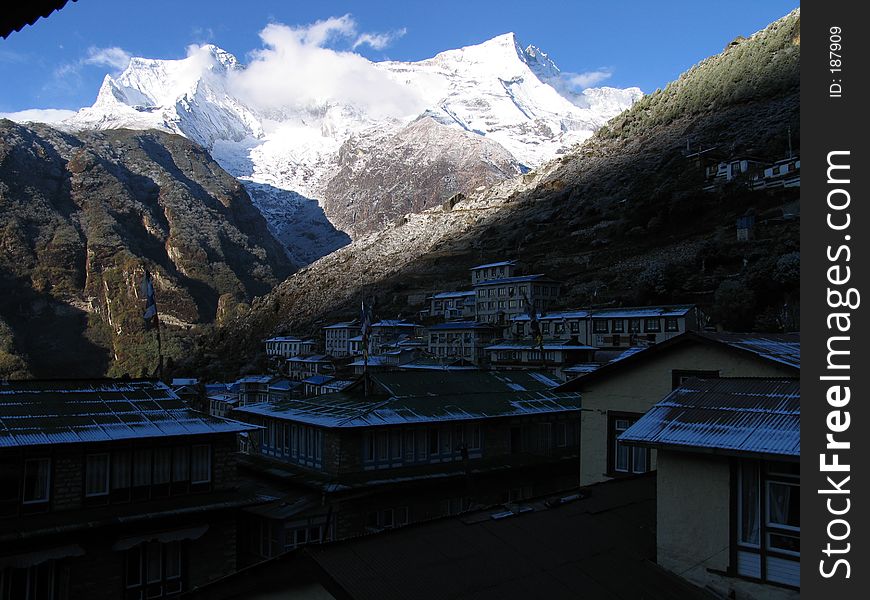 Village of Namche Bazar, in the mountains of Nepal, very early in the morning. Village of Namche Bazar, in the mountains of Nepal, very early in the morning