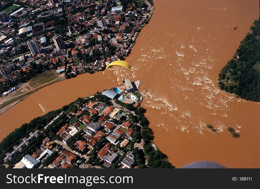 Paragliding over the river in Brazil Valadares