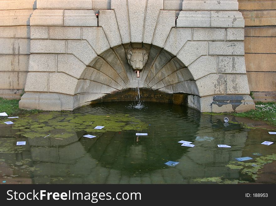 Fountain reflection with a lot of litter. Fountain reflection with a lot of litter