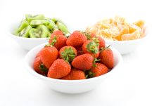 Kiwi, Strawberry And Mandarine, Tangerine In White Bowls Stock Image Kiwi, Strawberry And Mandarine, Tangerine In White Bowls Stock Image