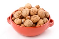 Red Bowl With Mixed Nuts, Walnuts, Hazelnuts, Almonds Royalty Free Stock Image Red Bowl With Mixed Nuts, Walnuts, Hazelnuts, Almonds Royalty Free Stock Image