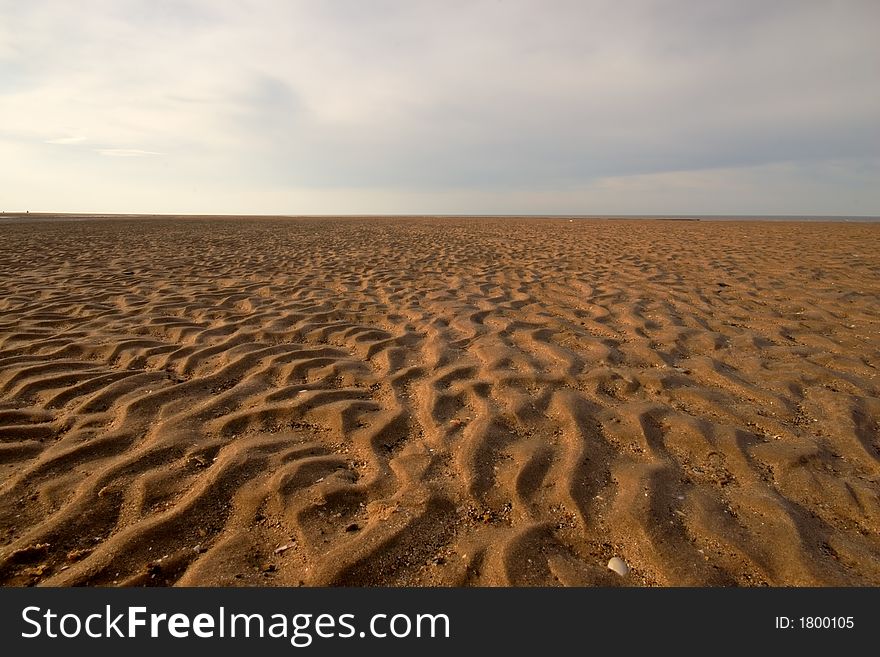 Empty beach with sand ripples. Empty beach with sand ripples