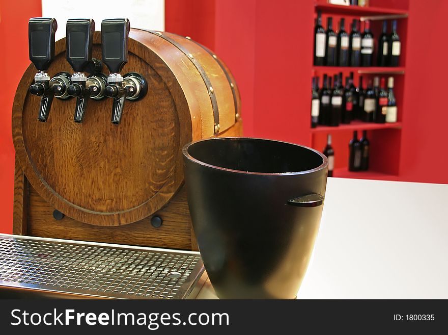 Bar with wine collection behind. Bar with wine collection behind